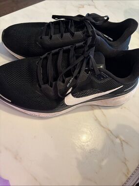 Nike Women’s Black Running Shoes with White Swoosh Accent